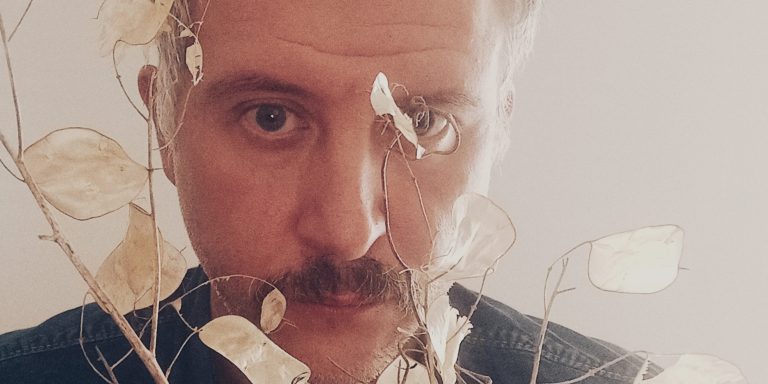 UPUPAYĀMA surrounded by dried leaves.